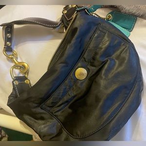 Coach purse; great condition; black with gold zipper/accents and teal detail